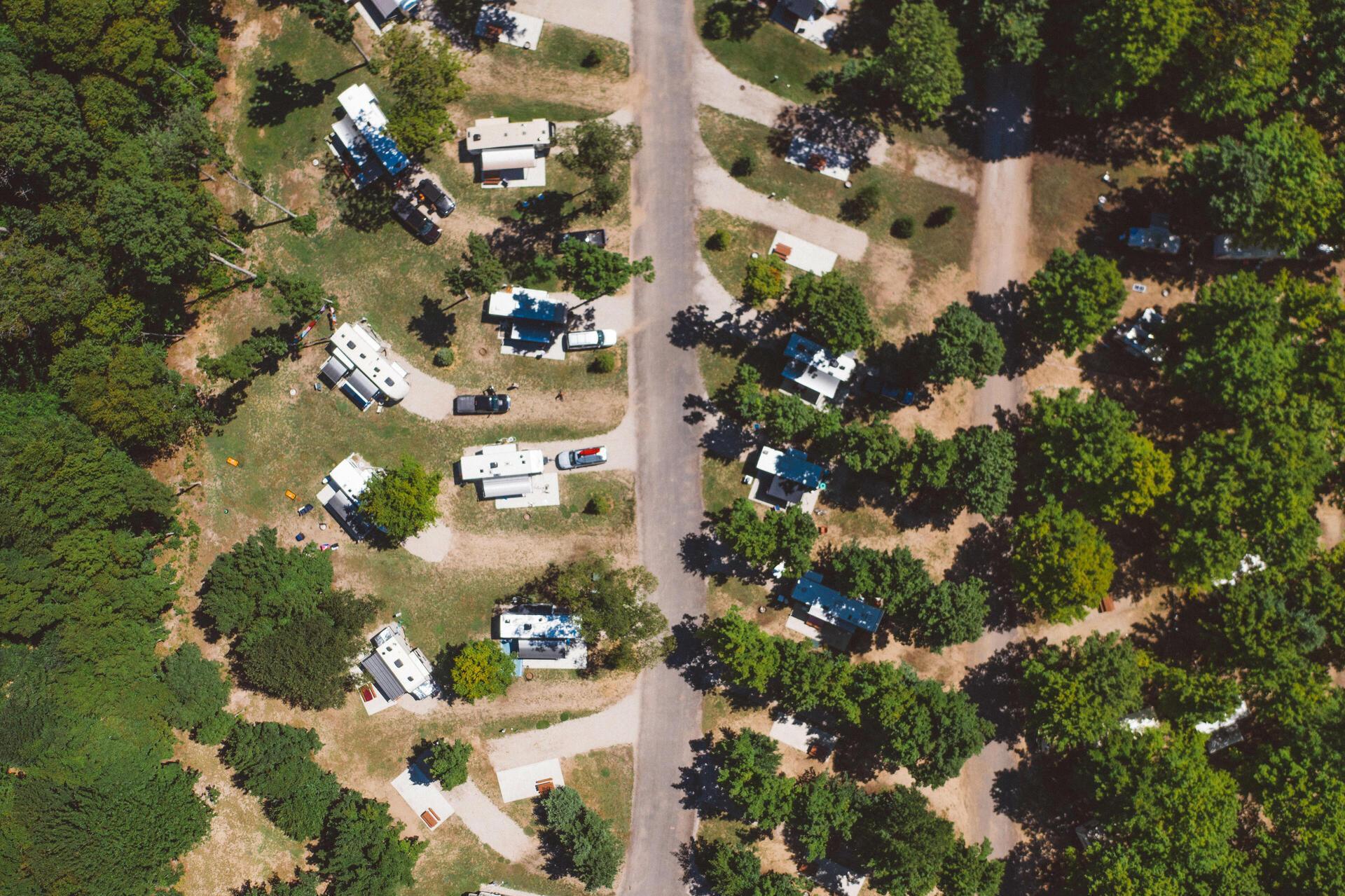 RV Park Full Hookup Sites Aerial Drone Flyover - Indigo Bluffs